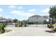 Community gate at Estuary at St. Johns, featuring manicured landscaping and a beautiful design at 4548 Dulwik Pl, Sanford, FL 32771