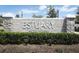 Stone community sign at Estuary at St. Johns features manicured landscaping and beautiful design at 4548 Dulwik Pl, Sanford, FL 32771