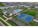 Aerial view of community amenities including a pool, playground, pickleball court and grassy area at 4828 Abbeywood Aly, Winter Garden, FL 34787