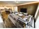 Open-concept living room with modern decor and lots of seating at 4828 Abbeywood Aly, Winter Garden, FL 34787