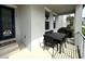Covered patio with outdoor dining set, ideal for entertaining at 4828 Abbeywood Aly, Winter Garden, FL 34787