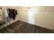 Spacious walk-in closet featuring ample shelving and plush carpeting at 4828 Abbeywood Aly, Winter Garden, FL 34787