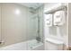 Modern bathroom featuring a shower-tub combo with sleek glass door and towel rack at 5245 W Irlo Bronson Memorial Hwy # 170, Kissimmee, FL 34746