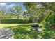 Lush backyard with a tire swing at 5494 Glen Oak Pl, Sanford, FL 32771
