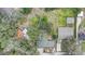 An aerial view of a home showcasing the roof and surrounding landscape at 5501 Vance Ave, Orlando, FL 32810