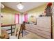 Bright bedroom featuring a decorative light fixture, and coordinating furnishings at 5501 Vance Ave, Orlando, FL 32810