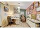 Cozy home office with a desk, chair, massage chair, and decorative wall art at 5501 Vance Ave, Orlando, FL 32810