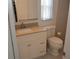 This bathroom features a white vanity, a neutral color scheme, and a tile shower at 622 Alton Rd, Winter Springs, FL 32708