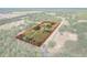Aerial perspective of large parcel, outlining land and highlighting the home's setting at 6803 Round Lake Rd, Mount Dora, FL 32757
