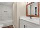 Bathroom featuring a shower, toilet and modern vanity at 6803 Round Lake Rd, Mount Dora, FL 32757