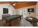 Game room featuring a billiards table, foosball, and dart board at 6803 Round Lake Rd, Mount Dora, FL 32757
