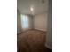 Cozy bedroom with plush carpeting and natural light from window at 734 Via Como St, Poinciana, FL 34759