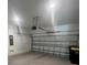 Spacious two-car garage with overhead door and plenty of room for parking and storage at 734 Via Como St, Poinciana, FL 34759