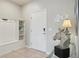 Inviting foyer features tile flooring and a decoratively appointed entry at 7554 Oak Spring Ln, Davenport, FL 33837