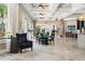 Elegant lounge area with comfortable seating, stylish decor, and abundant natural light at 7554 Oak Spring Ln, Davenport, FL 33837