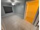 Spacious bedroom features neutral walls, tile flooring, ceiling fan, and a walk-in closet at 814 Crest Pines Dr # 915, Orlando, FL 32828