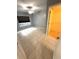 Bedroom features neutral walls, tile flooring, ceiling fan, and a walk-in closet at 814 Crest Pines Dr # 915, Orlando, FL 32828