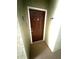 Brown front door with white trim and a door knocker labeled with the unit number 915 at 814 Crest Pines Dr # 915, Orlando, FL 32828