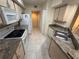Kitchen features stainless steel appliances, ample counter space, and light cabinetry at 814 Crest Pines Dr # 915, Orlando, FL 32828
