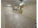 Open concept living room and kitchen area with tile flooring at 814 Crest Pines Dr # 915, Orlando, FL 32828