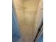 Walk-in closet offers tile flooring and wire shelving for efficient storage at 814 Crest Pines Dr # 915, Orlando, FL 32828