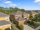 Aerial view of the neighborhood with well-maintained lawns at 957 Orange Cosmos Blvd, Davenport, FL 33837