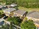 Aerial shot of the neighborhood with well-maintained lawns and landscaping at 957 Orange Cosmos Blvd, Davenport, FL 33837