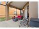View of the furnished patio with outdoor seating at this home at 957 Orange Cosmos Blvd, Davenport, FL 33837