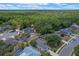 Desirable neighborhood with mature trees, community pond, and well-maintained homes at 1003 Hart Branch Dr, Oviedo, FL 32765