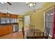 Dining area next to the kitchen showing cabinets and lighting at 1003 Hart Branch Dr, Oviedo, FL 32765