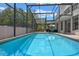 Relaxing screened-in pool area with ample space for outdoor furniture and leisure at 1003 Hart Branch Dr, Oviedo, FL 32765