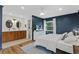 Open bedroom concept featuring an ensuite bathroom and TV at 105 Dublin Dr, Lake Mary, FL 32746