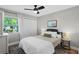 Comfortable bedroom with ceiling fan, closet, natural light and stylish decor at 105 Dublin Dr, Lake Mary, FL 32746