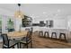 Open-concept kitchen with stainless steel appliances, a center island, and a dining area at 105 Dublin Dr, Lake Mary, FL 32746