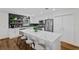 Modern kitchen with quartz countertops, a stylish backsplash, stainless appliances, and ample storage at 105 Dublin Dr, Lake Mary, FL 32746