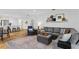 Cozy living room with a plush sofa, decorative pillows, and stylish decor throughout at 105 Dublin Dr, Lake Mary, FL 32746
