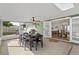 Outdoor patio with dining set and ceiling fan, perfect for entertaining at 105 Dublin Dr, Lake Mary, FL 32746