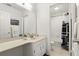 Bright bathroom with white vanity, tile flooring, and a shower/tub combination at 1136 Villa Ln # 96, Apopka, FL 32712