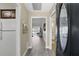 Inviting entryway with wood floors, leading to the living areas and a view of the home's interior at 1136 Villa Ln # 96, Apopka, FL 32712