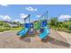 Vibrant playground with slides and climbing structures on a soft, mulch-covered surface at 1151 Wildmeadow Run, Winter Park, FL 32792