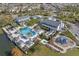 Aerial shot of a resort-style pool area with lounge chairs, cabanas, and a playground at 1151 Wildmeadow Run, Winter Park, FL 32792