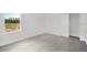 Bedroom featuring a window with a view of the outdoors and a closet at 12863 Harvest Rain Ave, Winter Garden, FL 34787