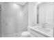 Modern bathroom featuring a glass-enclosed shower and a sleek vanity at 12869 Harvest Rain Ave, Winter Garden, FL 34787