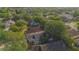 Residential community featuring single Gathering homes, mature trees and common areas with lakes at 13216 Wild Duck Ct, Orlando, FL 32828