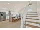 Modern kitchen featuring stainless steel appliances, a spacious center island, and ample storage at 13430 Early Frost Cir, Orlando, FL 32828