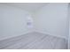 Bedroom with neutral walls, laminate floors, one window and white trim at 13434 Mallard Cove Blvd, Orlando, FL 32837