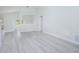 Bright and airy living room with light-colored flooring, white walls, and ample natural light at 13434 Mallard Cove Blvd, Orlando, FL 32837