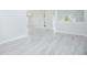 Bright living room boasts modern flooring and ample natural light at 13434 Mallard Cove Blvd, Orlando, FL 32837