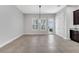 Open-concept dining area with backyard access and natural light at 13662 Behring Ave, Orlando, FL 32827