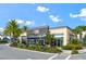 Exterior shot of the community's fitness center, showcasing its modern architecture and landscaped surroundings at 13662 Behring Ave, Orlando, FL 32827